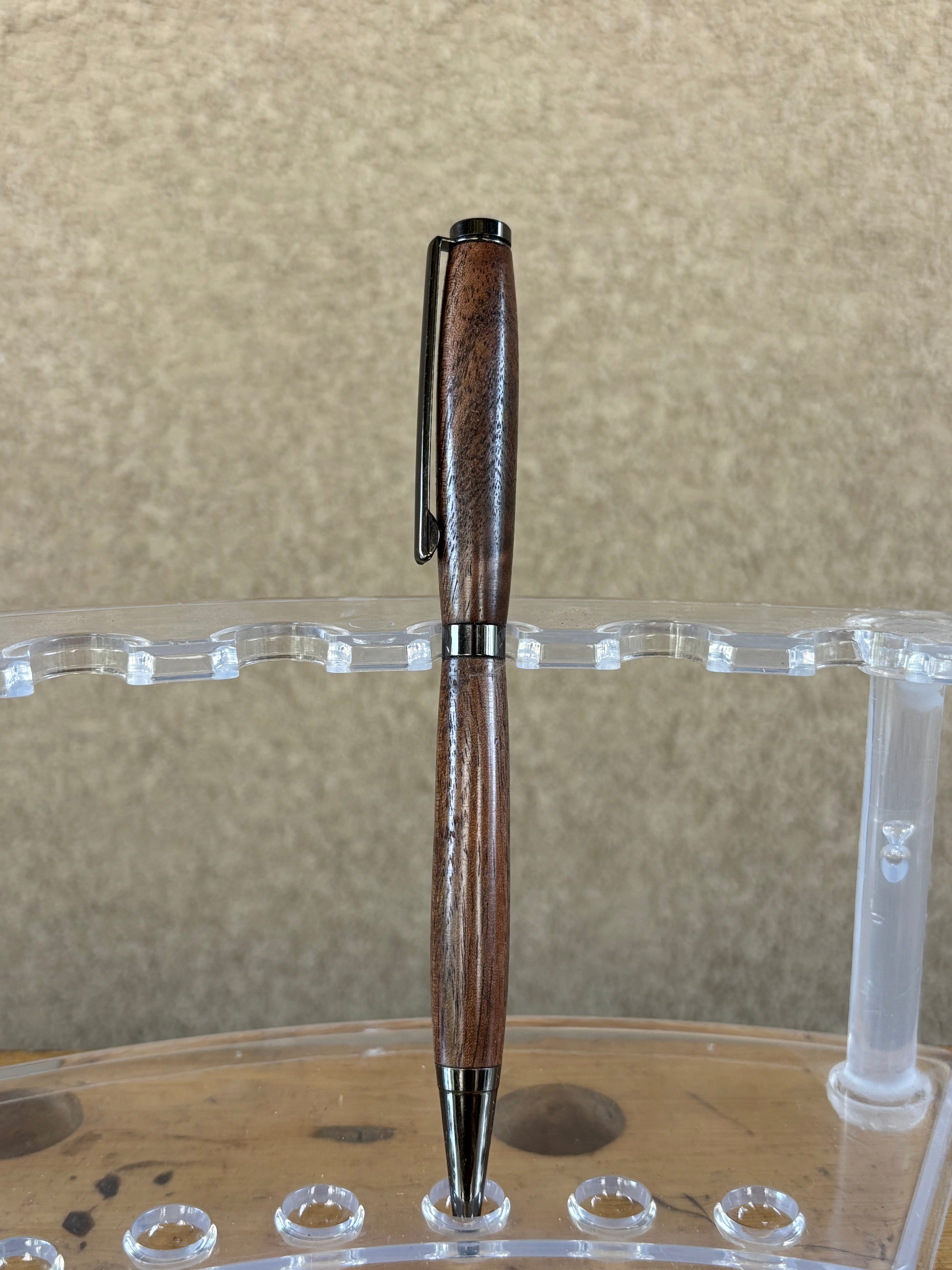 Highly figured Walnut pen with black hardware